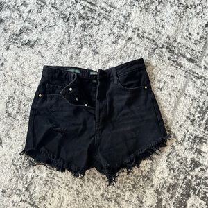 White fable black jean shorts